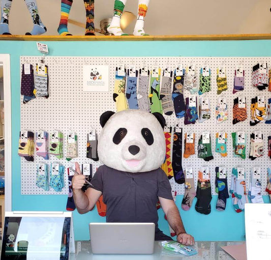 Sock Panda hard at work making socks and writing down thouhgts